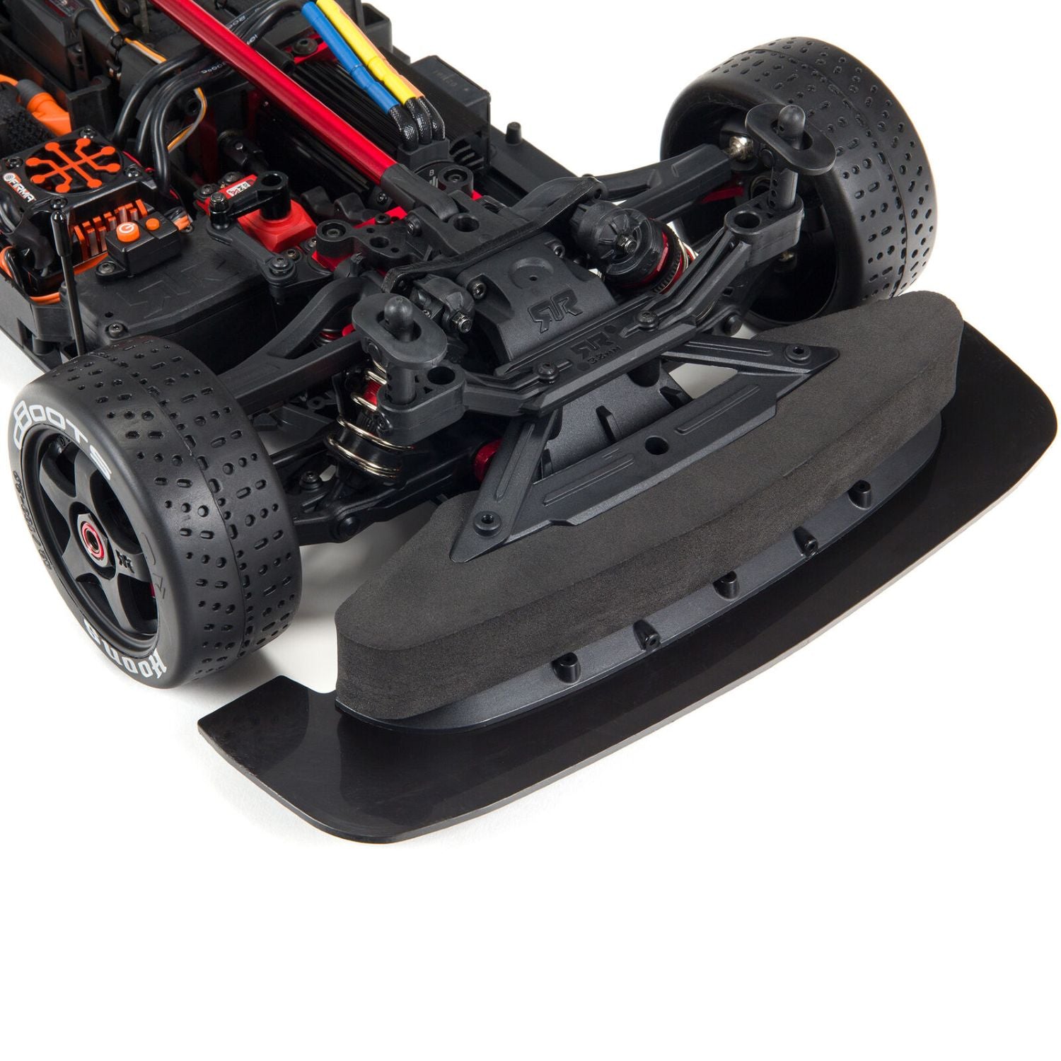 1/7 ARRMA INFRACTION 6S AVC 4X4 RTR - Close-up of a black RC car with visible components on a white background