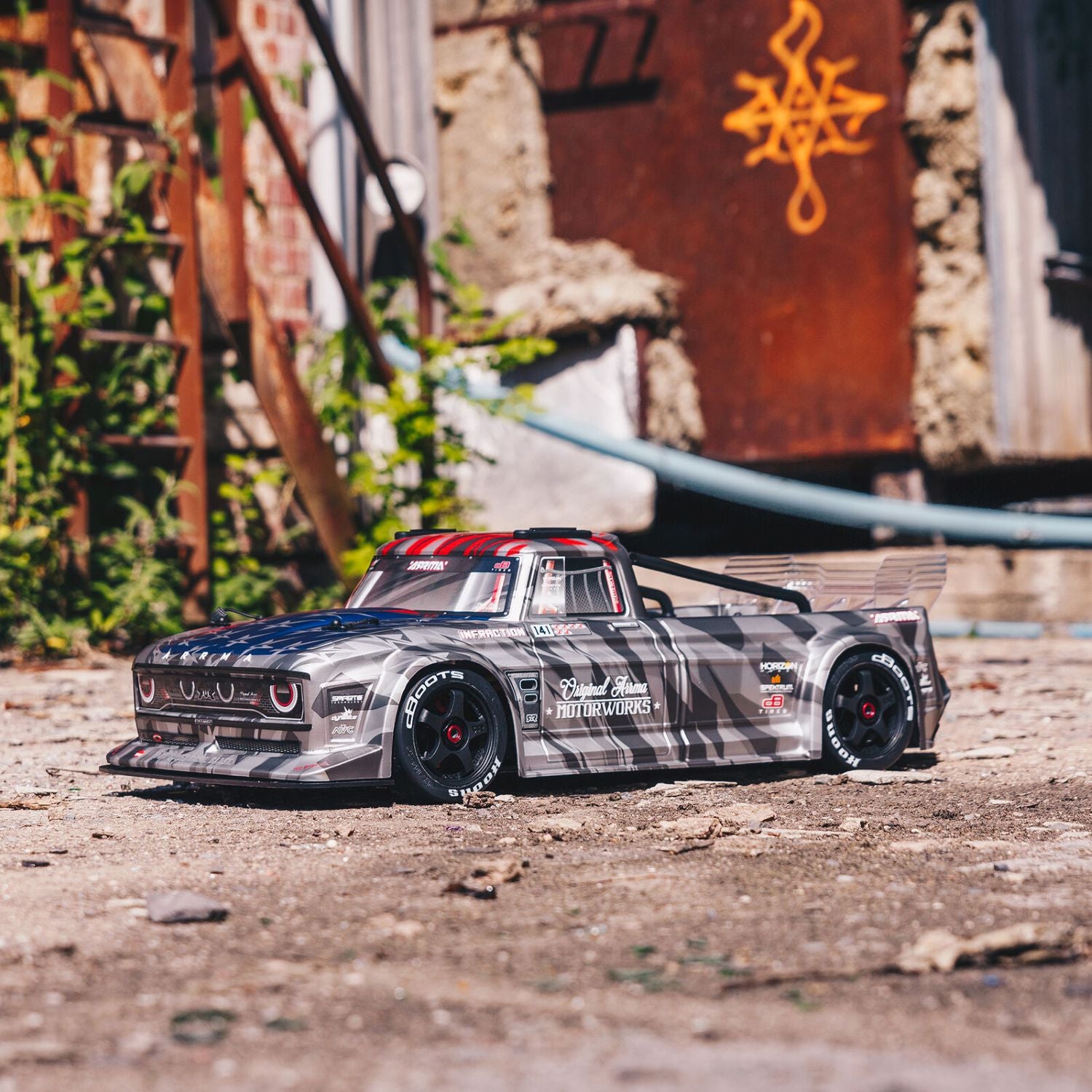 1/7 ARRMA INFRACTION 6S AVC 4X4 RTR - Model truck on a dirt surface with a rustic background