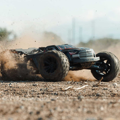 1/8 ARRMA KRATON 6S EXB 4X4 RTR Brushless Speed Truck - Off-road RC car driving on a dirt track with dust around