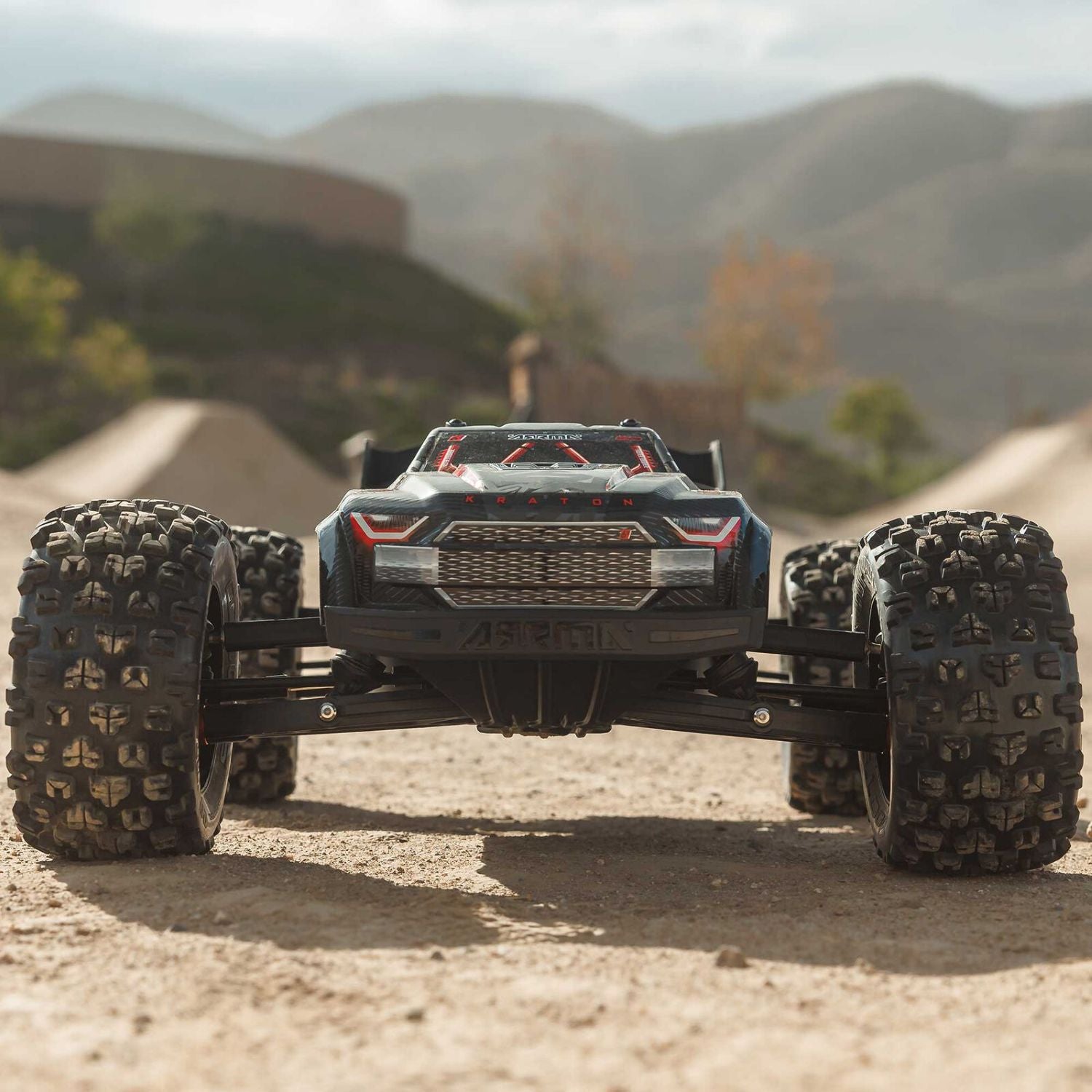 1/8 ARRMA KRATON 6S EXB 4X4 RTR Brushless Speed Truck- Off-road vehicle on a dirt track with mountains