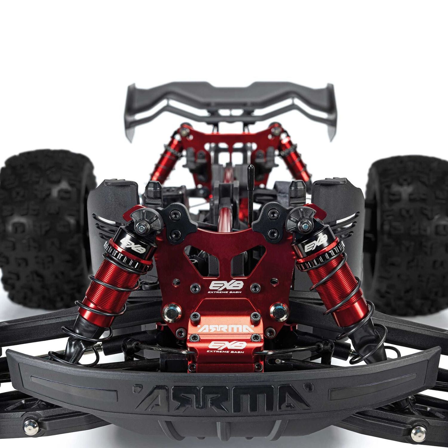 Close-up of a red and black RC car chassis with visible branding - 1/8 ARRMA KRATON 6S EXB 4X4 RTR Brushless Speed Truck
