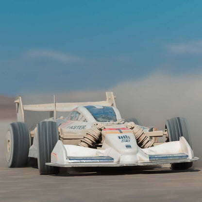 1/7 ARRMA LIMITLESS 120 8S AVC 4X4 RTR - white race car on a desert track with a clear blue sky.