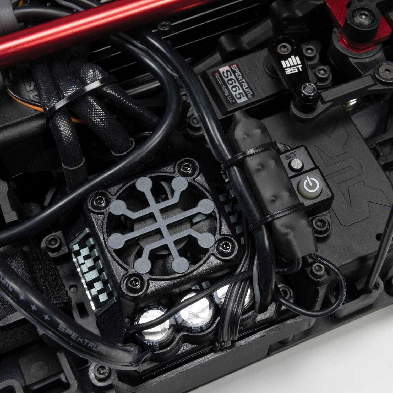 1/7 ARRMA LIMITLESS 120 8S AVC 4X4 RTR - Close-up of engine components with visible branding