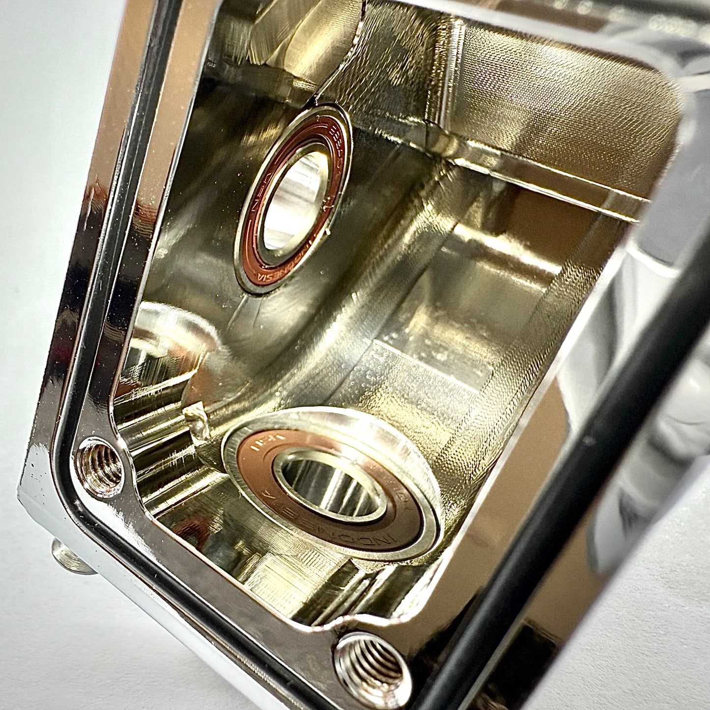 Detailed Close-Up Showing Bearing and Machined Cavity Inside Perfect Pass 7075 Aluminum Bulkhead